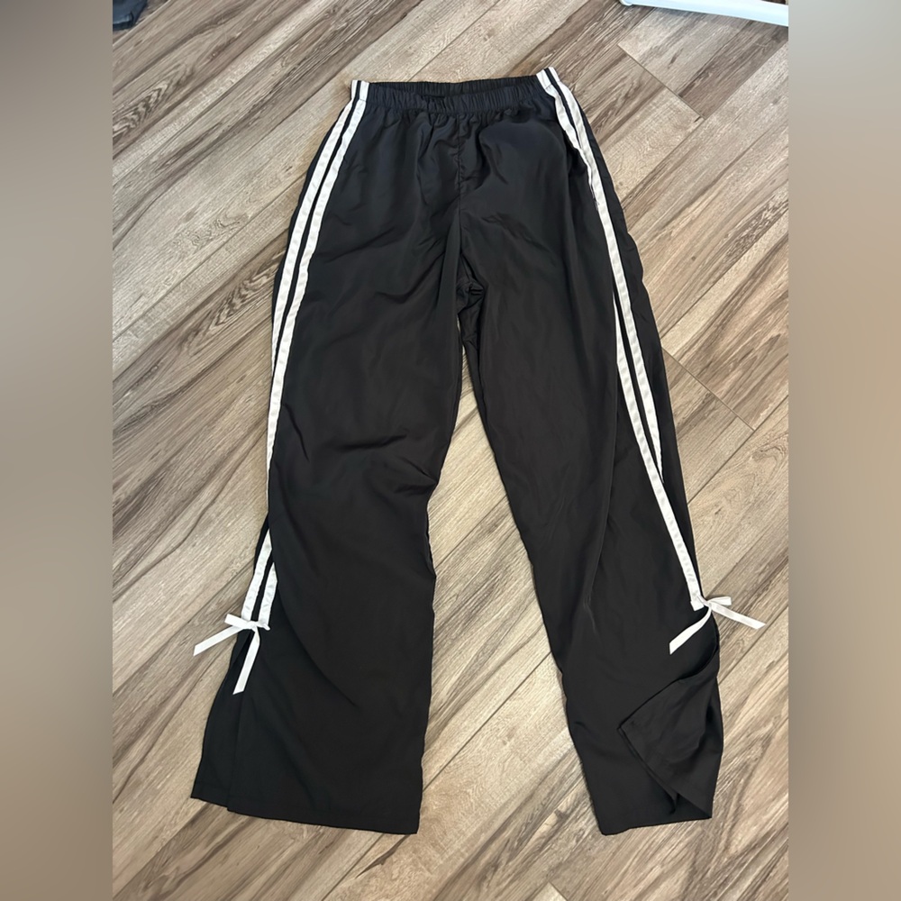 Track pants with bows